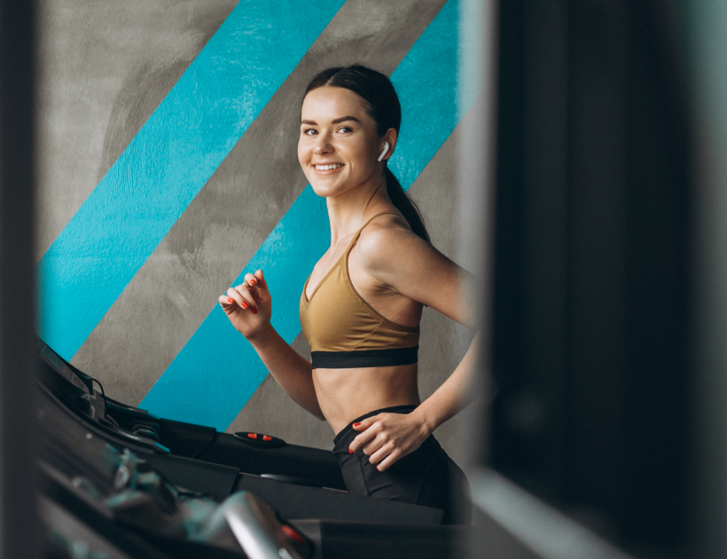 healthy-woman-running-track-gym
